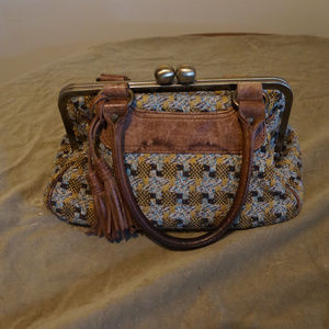 Nest leather and textile kisslock purse